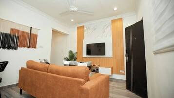 Premium Studio Suite | Living area | Smart TV