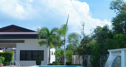 Cozy 1-bed unit near SRP Talisay