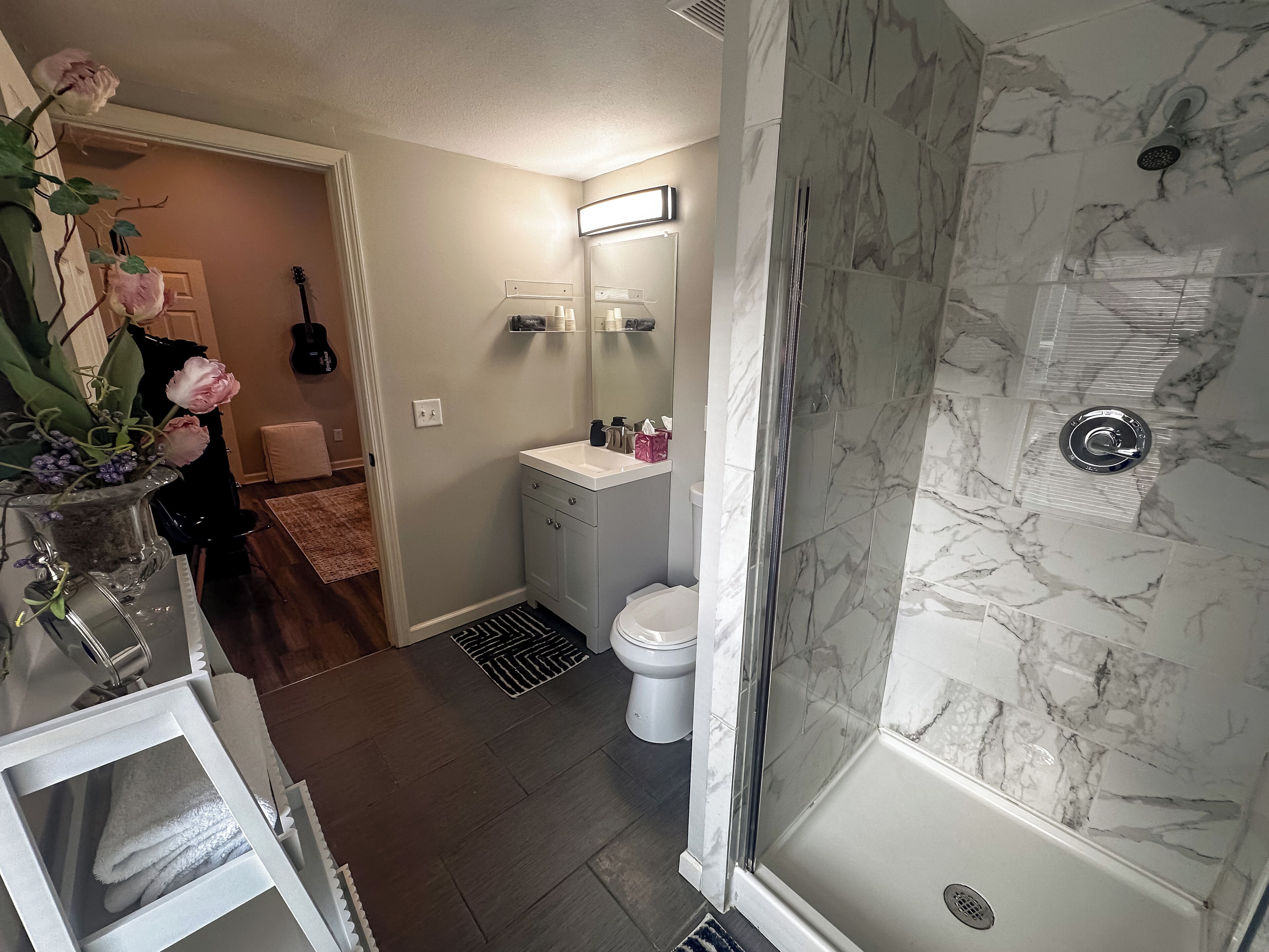 Shower, hair dryer, towels, soap