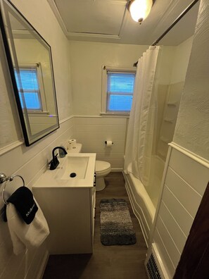Hair dryer, towels, soap, toilet paper