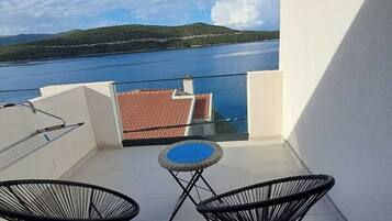Deluxe Apartment, Sea View | Terrace/patio