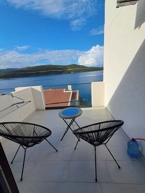 Apartamento Deluxe, vistas al mar | Terraza o patio