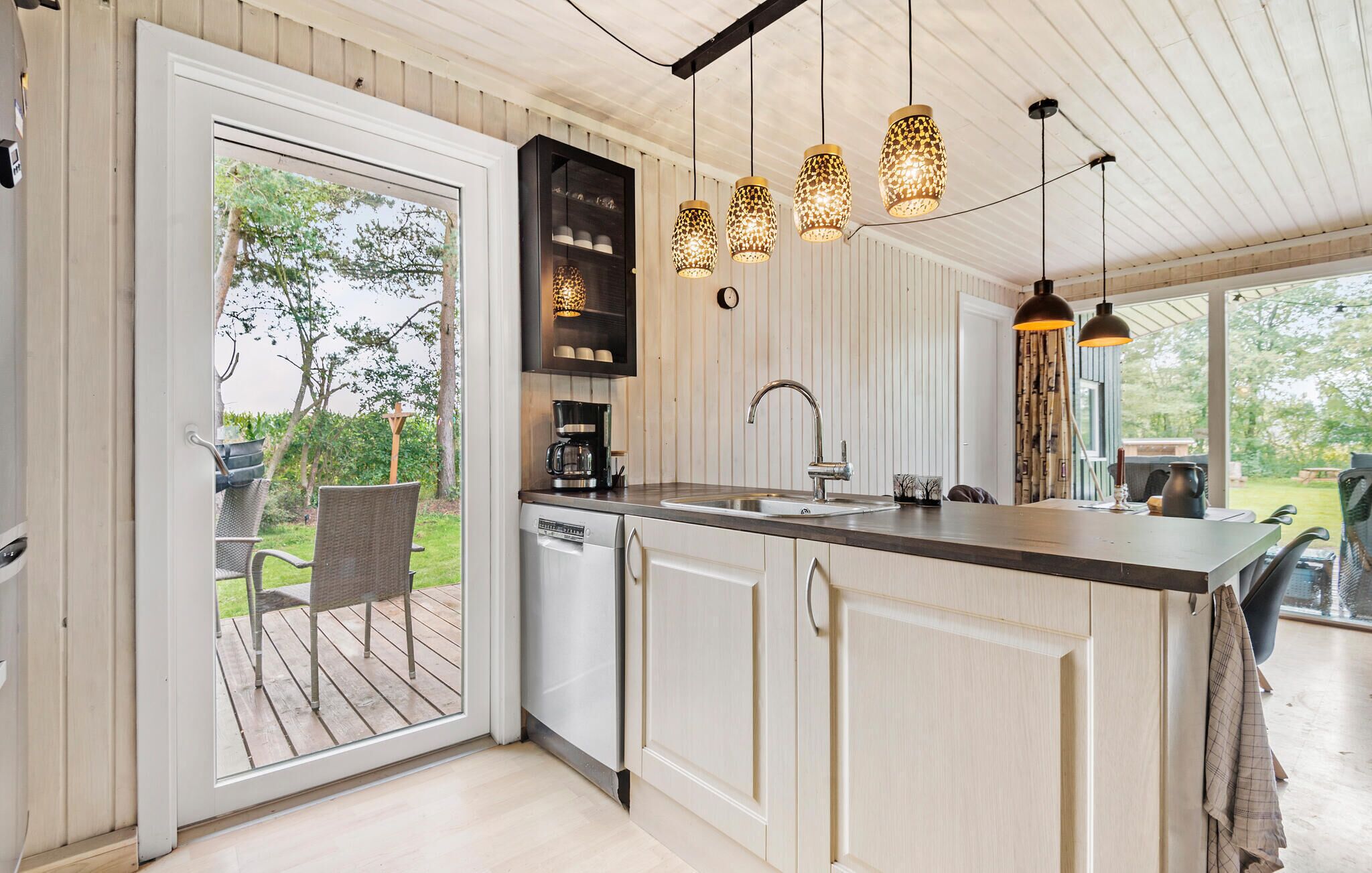 Fridge, stovetop, dishwasher, coffee/tea maker