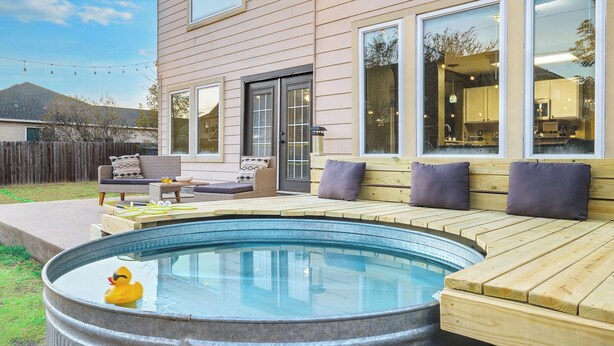 Terrace/patio - 5BR Retreat: Arcade, Cowboy Pool & Volleyball Oasis in Huge Backyard (Round Rock)