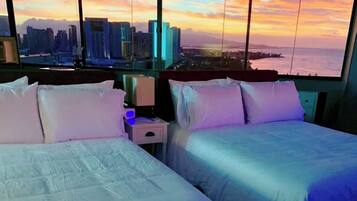 1 habitación, tabla de planchar con plancha y cuna de viaje