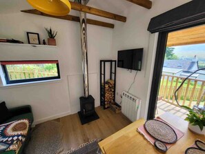 TV, fireplace - Grianach Cabin near Roy Bridge (Roybridge)