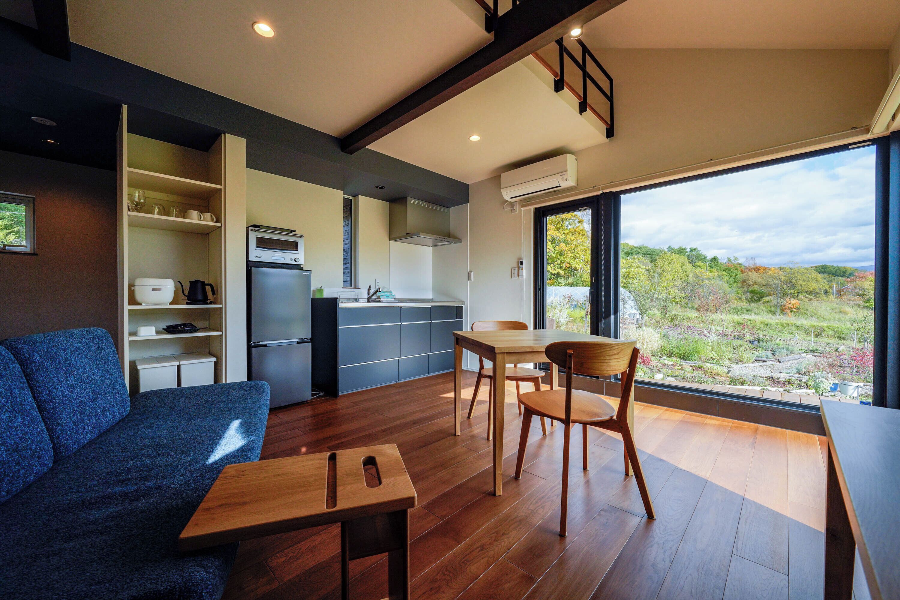 Panoramic Twin Room, Garden View | Living area