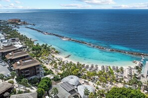 On the beach, sun loungers, beach towels