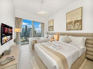 A hotel room with two beds, a TV, a desk, and a view of the cityscape. - New 2BR | Burj & Fountain View |Dubai Mall (Dubai)
