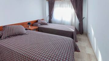 2 habitaciones y ropa de cama