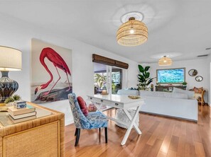 Smart TV, fireplace, books, printers