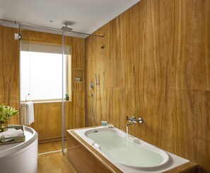 Suite, 1 Queen Bed (Deluxe Suite) | Bathroom | Eco-friendly toiletries, hair dryer, bathrobes, slippers - Storii By ITC Hotels Jaisalmer (Jaisalmer)