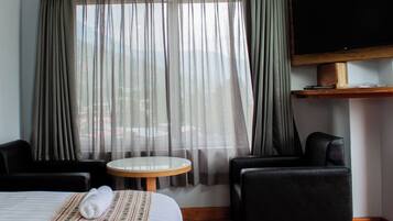 Deluxe Double Room, City View | Desk, laptop workspace, free WiFi