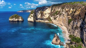 A coastal landscape with cliffs, clear blue waters, and a beach. - The Sebali Penida Beach Resort (Penida Island)