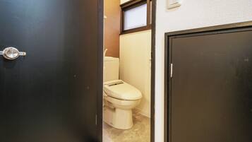 Shower, free toiletries, hair dryer, slippers