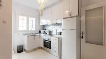 Appartement | Privékeuken | Een kinderstoel