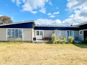 A two-story mobile home with a patio area, a small deck, and a covered outdoor seating area. - 6 Person Holiday Home in Skummeslovsstrand (Skummesloevsstrand)