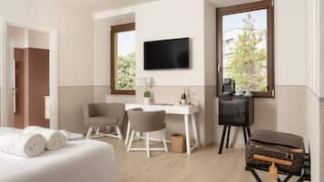 Deluxe Room | In-room safe, desk, laptop workspace, iron/ironing board