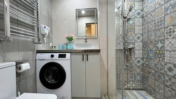 Hair dryer, towels, soap, toilet paper
