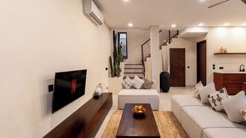 Deluxe Villa, Balcony, Hill View | Living area | Flat-screen TV