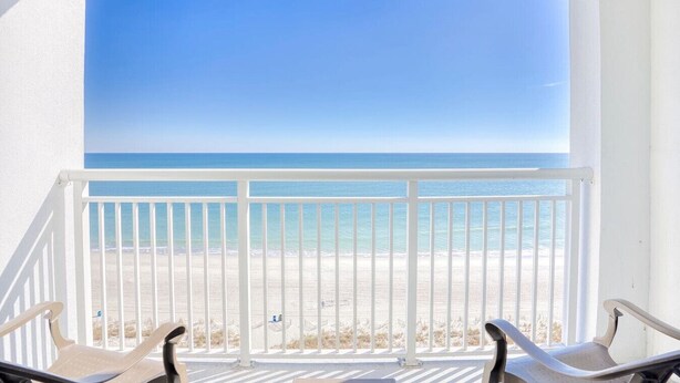 A balcony with a view of a beach and ocean. - Oceanfront Balcony Hot Tubs and Heated Lazy River (Myrtle Beach)