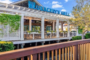 Outdoor dining - Oceanfront Condo with Resort Pools and Lazy River (North Myrtle Beach)
