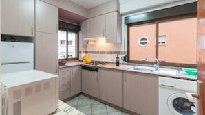 Appartement | Cuisine privée | Chaise haute