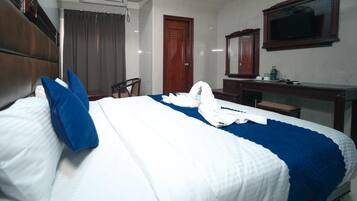 Standard Studio Suite | Desk, laptop workspace, blackout curtains, iron/ironing board