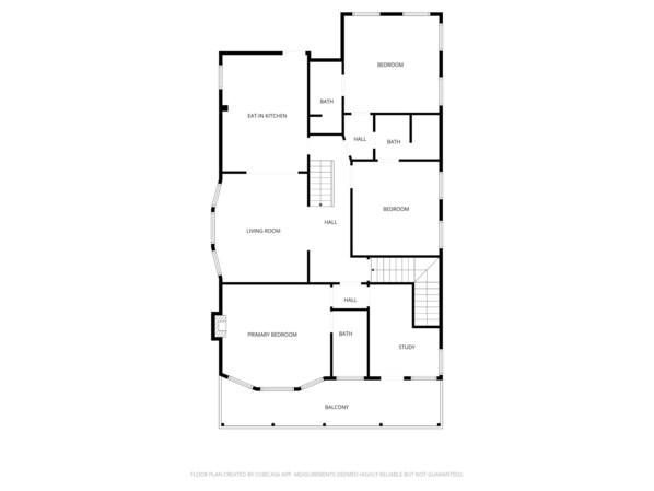 Plano de planta que muestra una sala de estar, dos dormitorios, un estudio, un balcón y un vestíbulo.