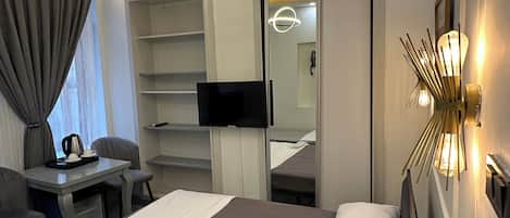 Egyptian cotton sheets, premium bedding, minibar, desk