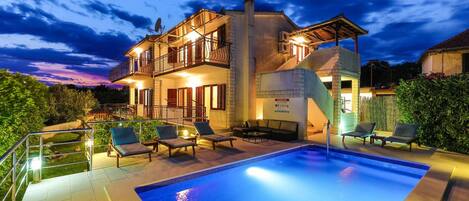 House (Six Bedroom Holiday Home) | Outdoor pool | Seasonal outdoor pool, sun loungers