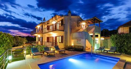 Relaxing Holiday Home With Pool, Fitness Area, and Entertainment Facilities