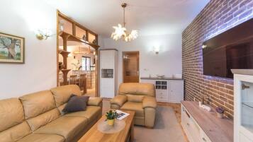 House (Six Bedroom Holiday Home) | Living room | 32-inch flat-screen TV with satellite channels