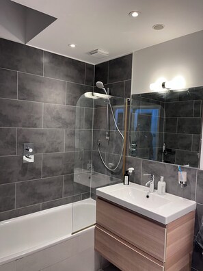 Shower, towels, toilet paper