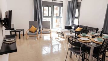 Standard Apartment, 3 Bedrooms | Living area | 25-inch flat-screen TV with cable channels