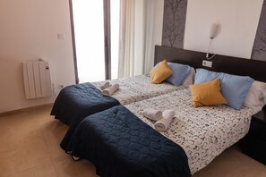 Standaard appartement, 3 slaapkamers, uitzicht op de stad | Hypoallergeen beddengoed, donsdekens, geluiddichte muren