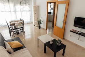 Standard Apartment, 2 Bedrooms | Living area | 25-inch flat-screen TV with cable channels