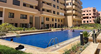 Chic 2-bedroom apartment with Pool ,WiFi, AC in vibrant Marrakesh.