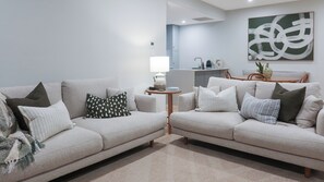 Luxury Apartment, 3 Bedrooms, Ocean View | Living area | 50-inch flat-screen TV with digital channels - Sea Dunes Luxury Apartments (Moana)