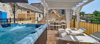 Elegant Stone House With Jacuzzi, Terrace, and Private Yard in Solta