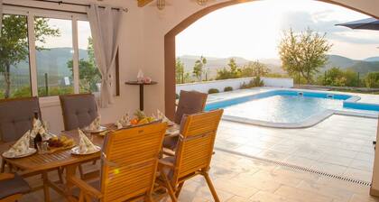 Peaceful Escape With Mountain Views, Heated Pool and Modern Amenities in Radošić