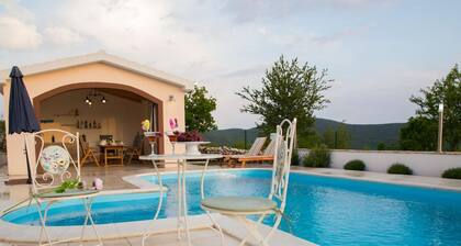 Peaceful Escape With Mountain Views, Heated Pool and Modern Amenities in Radošić