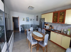 Apartment (Three Bedroom Apartment) | Private kitchen | Fridge - Spacious Apartment Steps From the Beach, With Private Terrace and Grill (Kastela)