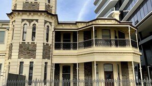 A historic building with a tower and a corner balcony. - Seafield Tower Glenelg Apartment no 4 (Glenelg)