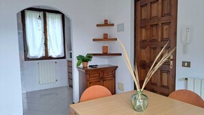 Appartement, patio | Aire de séjour