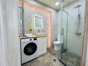 Hair dryer, towels, soap, toilet paper