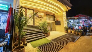 A hotel entrance with a sign reading "DAHABI THE VENUE" and a well-lit, inviting facade. - HOTEL VENUE Delhi Airport (New Delhi)