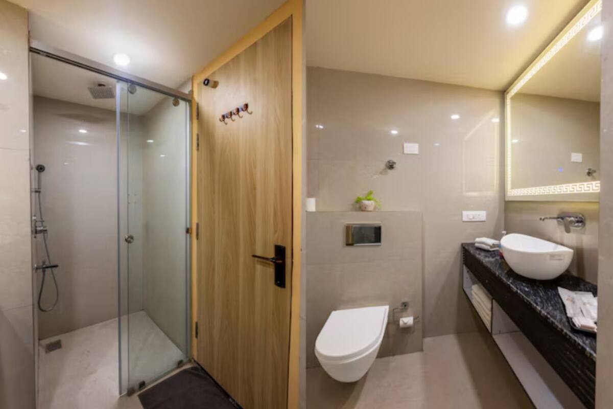 Deluxe-rum | Badrum | Dusch, handdukar, tvål och schampo