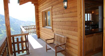 Chalet Nestled in Mountains and Garden