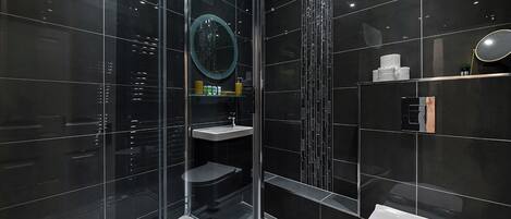 Shower, towels, soap, toilet paper